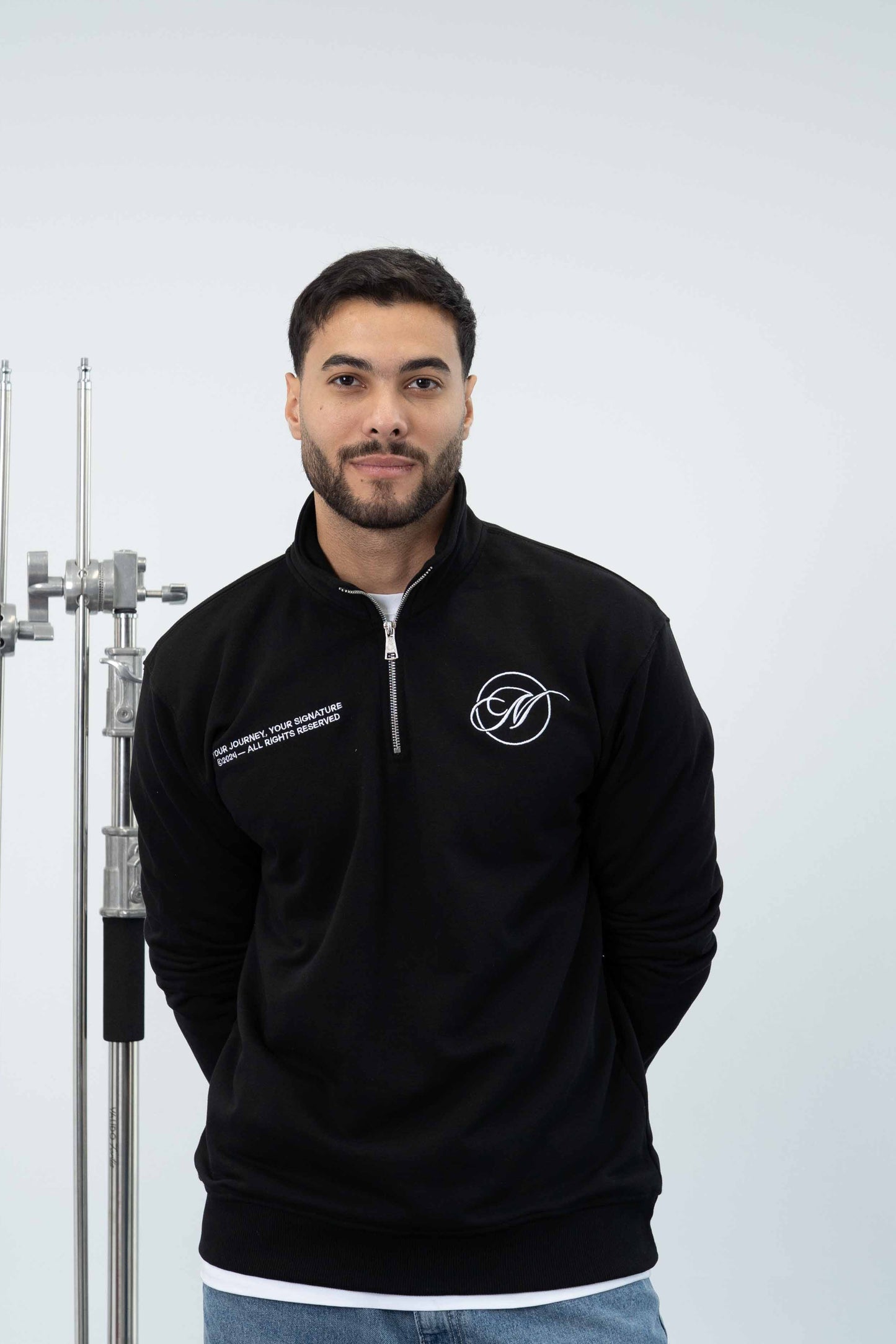 THE SIGNATURE QUARTER ZIP